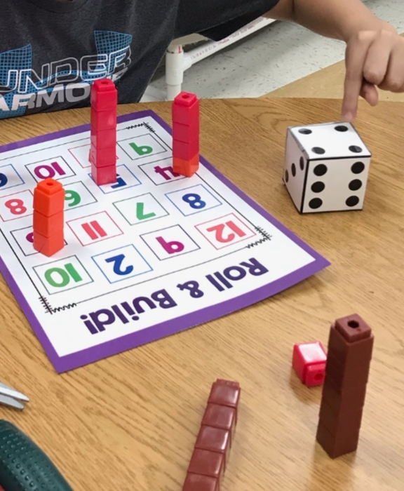 Learning about numbers through play. 